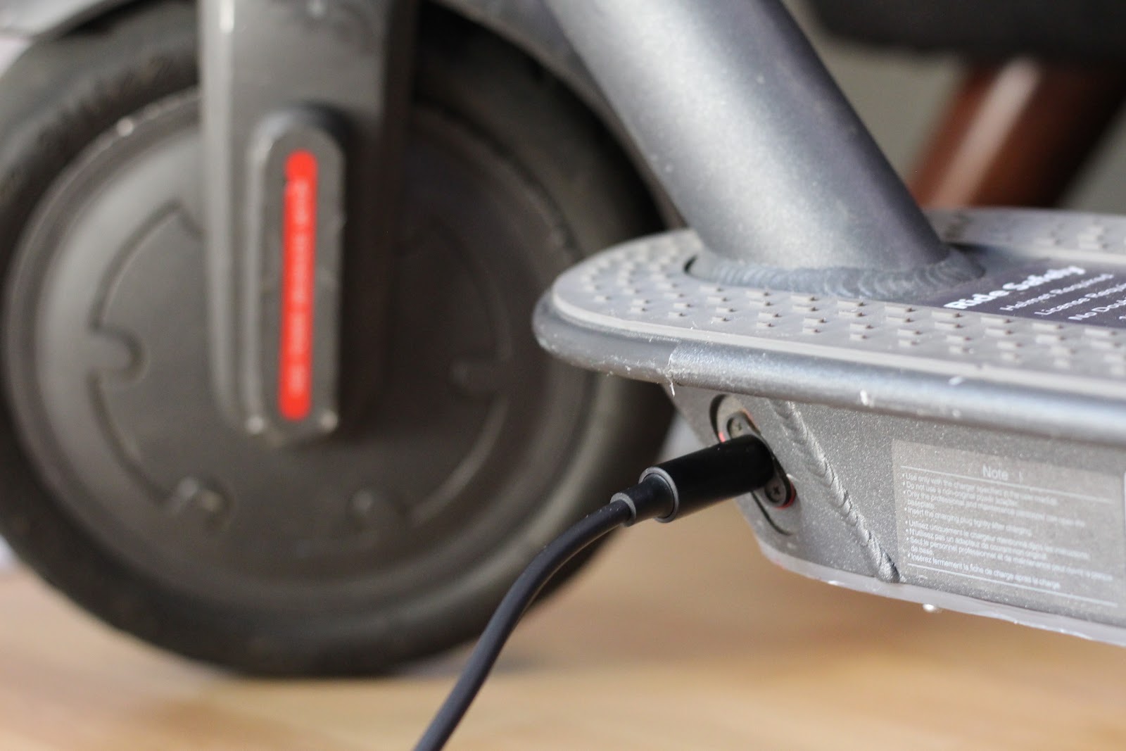 Plugging in a Bird Scooter to Charge
